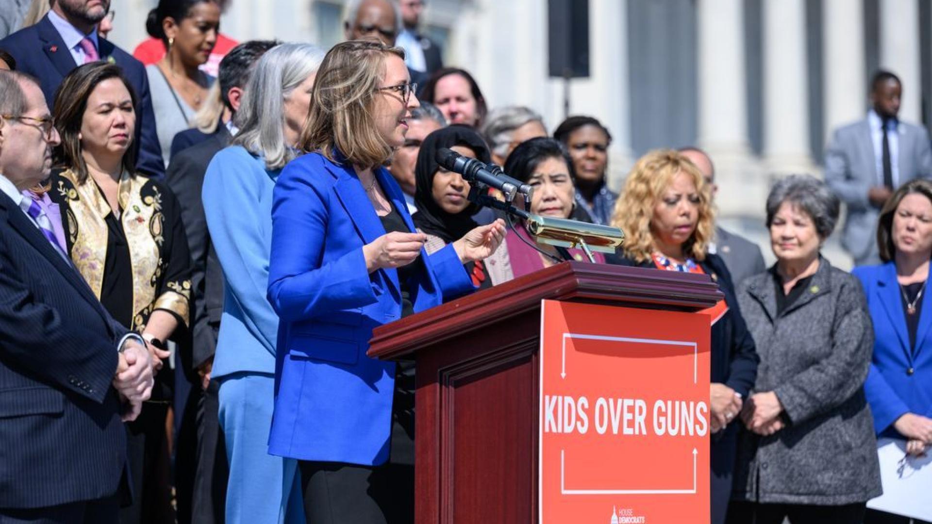 DWC members at press conference about gun reform. 